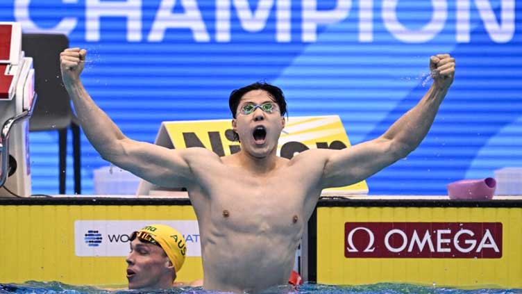 Breaststroke sensation Qin leads China swimming charge at Asian Games