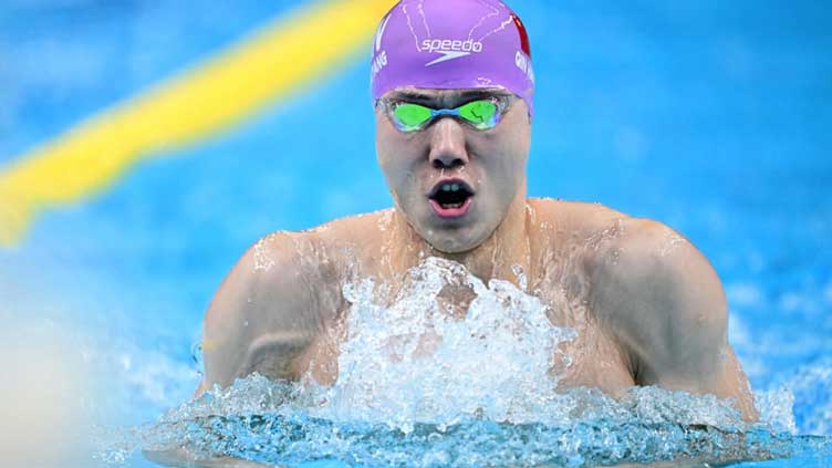 China in control as backstroke king Qin sets new Asian Games mark