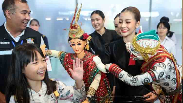 Chinese tourists get VIP welcome as Thai visa waiver programme begins