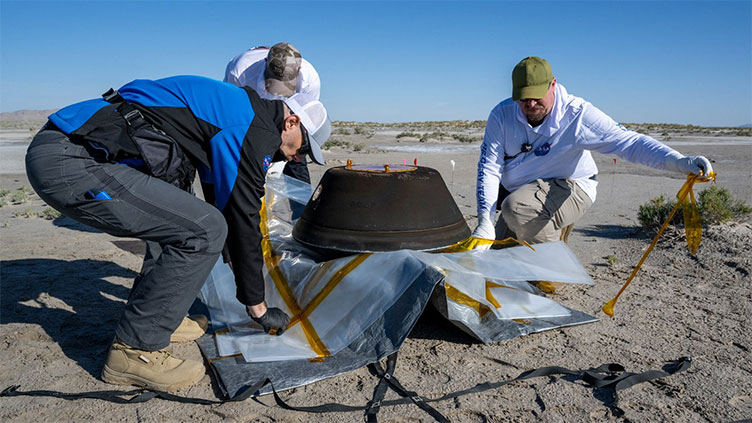 NASA experts to open capsule containing dust from asteroid Bennu