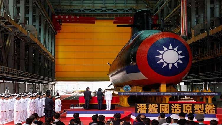 Taiwan reveals first homegrown submarine in defence milestone