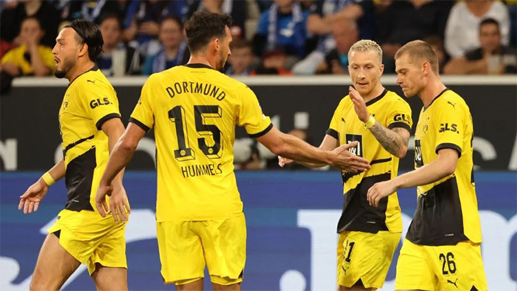 Fuellkrug, Reus special help 10-man Dortmund beat Hoffenheim to go top