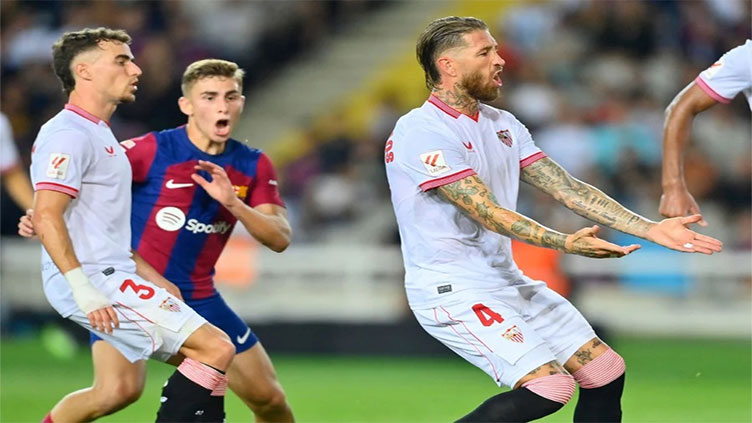 'Unlucky' Sergio Ramos own goal helps Barca beat Sevilla