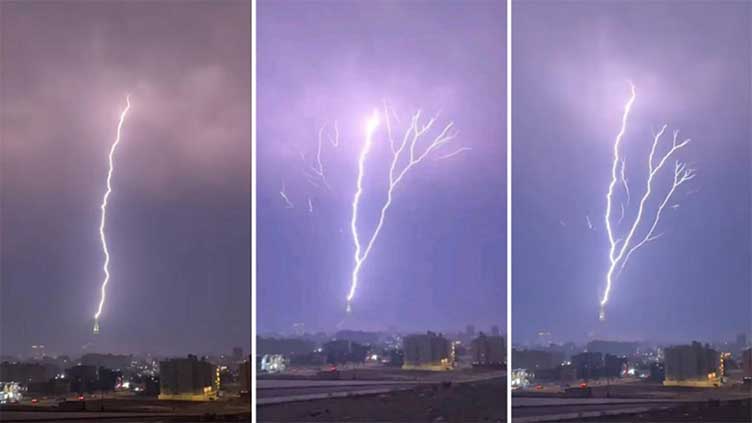 Video shows lightning strikes Makkah's clock tower, generating breathtaking scenes in sky
