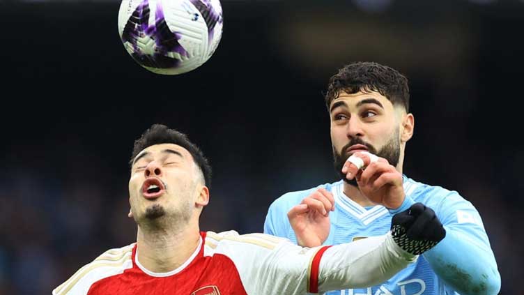 Arsenal draw with Manchester City as Liverpool go top in Premier League