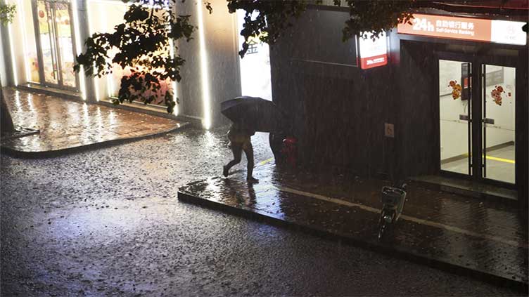 Violent storms kill 7 people in eastern China including 3 who fell from their apartments