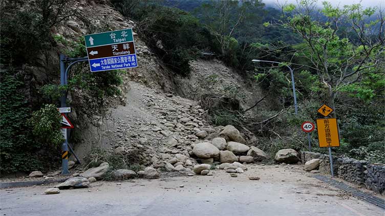 Taiwan earthquake rescuers face threat of landslides, rockfalls as death toll at 12