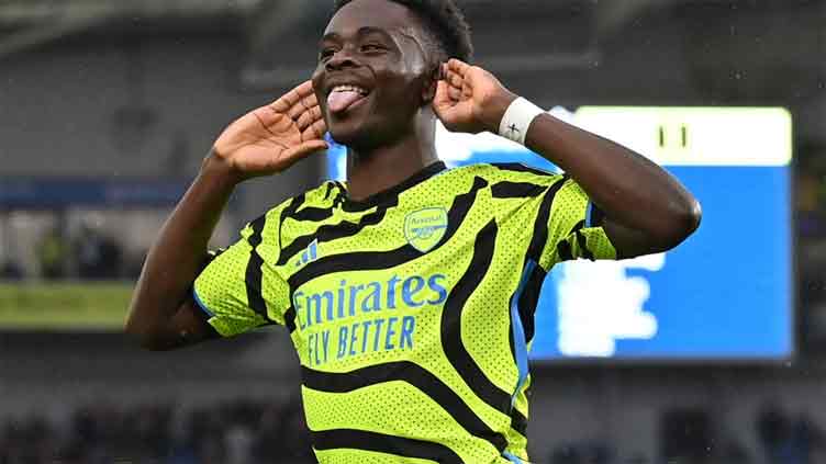 Arsenal back on top after easy win at Brighton