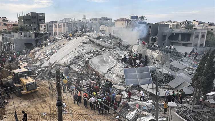 Rights group calls Israeli strike on Gaza building an 'apparent war crime'