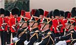 British, French troops march in historic joint parades in London and Paris in a show of solidarity