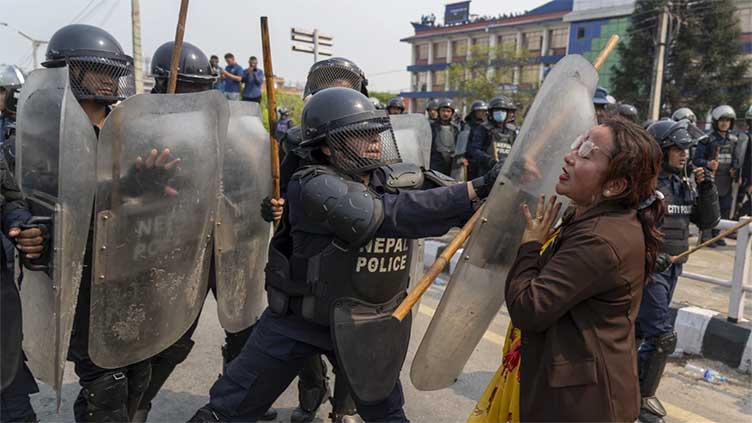 Protesters demanding restoration of Nepal's monarchy clash with police