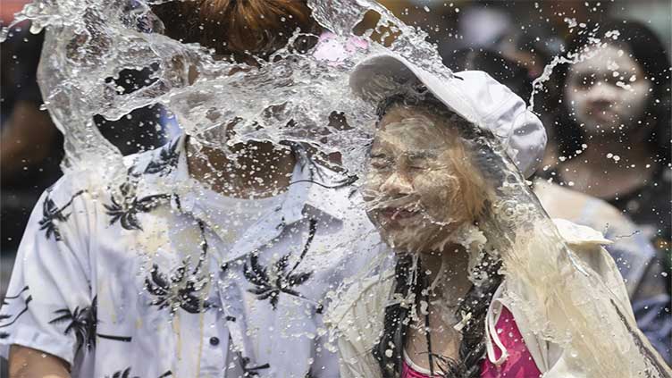 Water guns are in full blast to mark Thai New Year festivities despite worries about heat wave