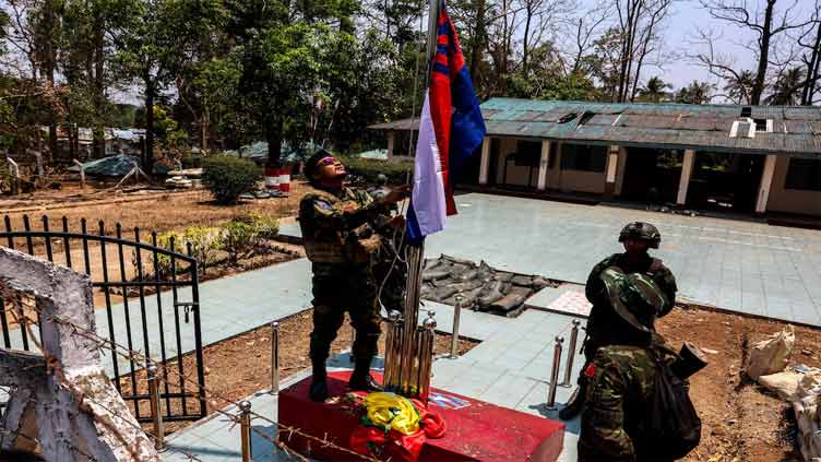 Rebels raise flag at seized Myanmar base, commander confident of retaining control