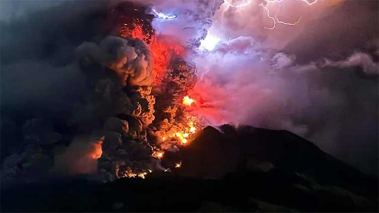 Thousands evacuated as Indonesia volcano erupts, causes tsunami threat