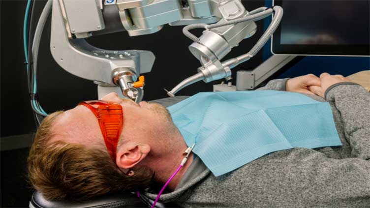 Robot dentist drills patient's teeth in first fully automated dental procedure