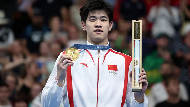 China's Pan wins 'magic' 100m freestyle gold in new world record