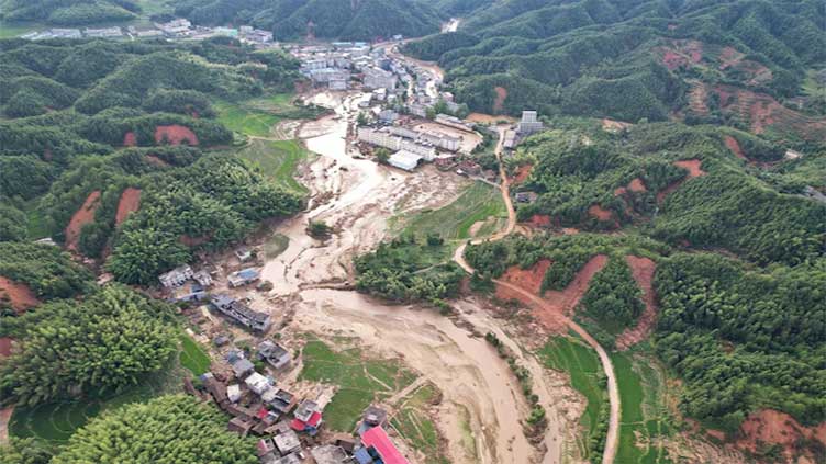 Rescuers in China race to find the missing, seal dykes after deadly floods