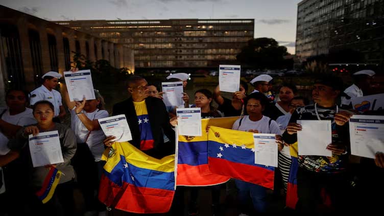 Venezuelan opposition says headquarters invaded as government alleges coup attempt