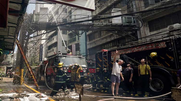 Building fire in Manila's Chinatown kills 11