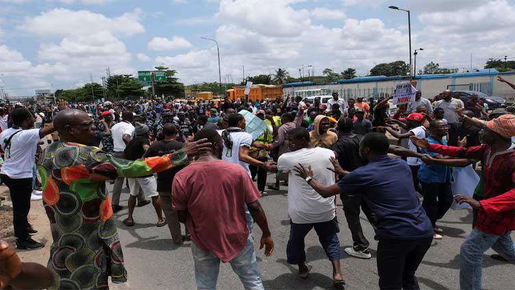 Nigerian police teargas protesters, arrest dozens