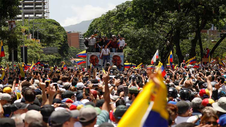 Venezuelans march over contested election, number of detained rises