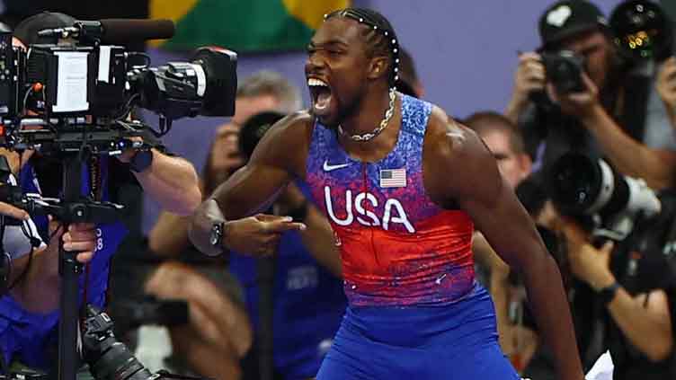 Noah Lyles wins 100m gold by five thousandths of a second