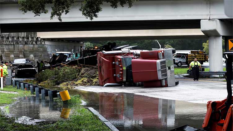 Debby, now a tropical storm, soaks northern Florida