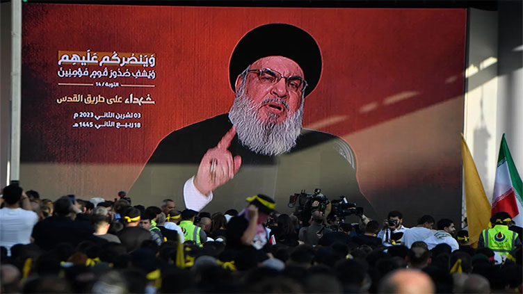 Hezbollah pledges to respond alone or with allies to Israeli killing of commander