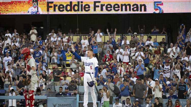 Emotional Freddie Freeman gets hug from Bryce Harper in return to Dodgers as ailing son recovers