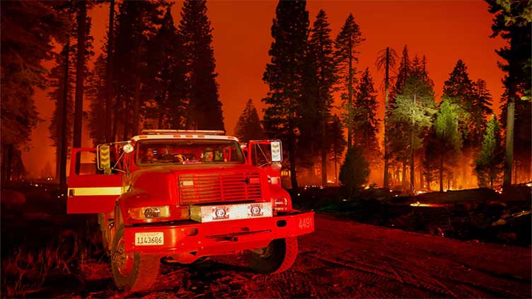 Wildfire torches hillside homes in southern California