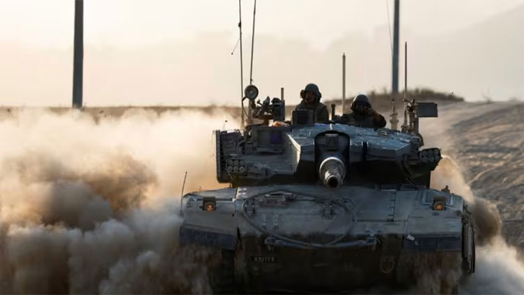 Israel pounds Gaza as Iran accuses it of seeking to 'expand war'