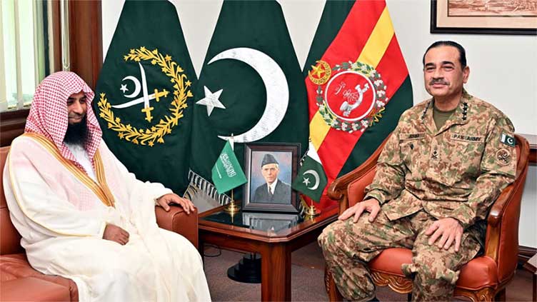 COAS Gen Asim discusses matters of mutual interest with Imam Masjid Al-Nabawi