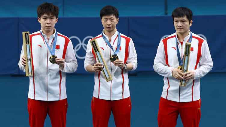 China's Ma writes name in history books with perfect Olympic ending