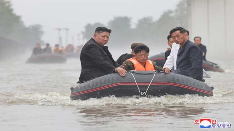 North Korean leader revisits flooded area, offers plan to bring people to capital