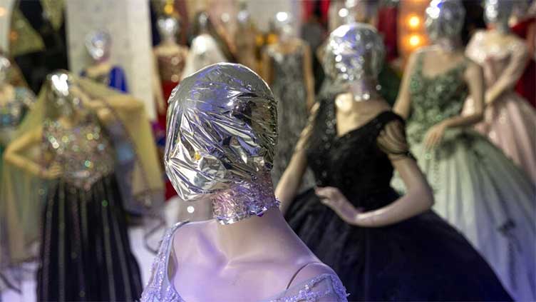 Faceless mannequins show off clothes in Afghanistan