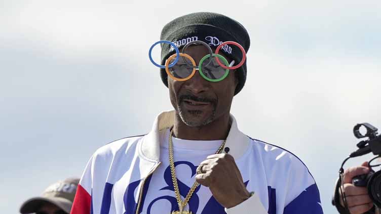 Snoop's side quests: Beyond the Olympics, rapper has proved versatility from cooking to wrestling