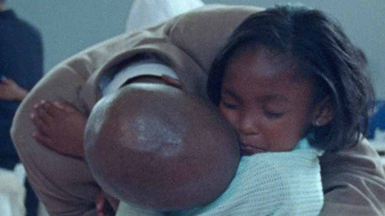 Incarcerated fathers and daughters reunite at a daddy-daughter dance in Netflix documentary