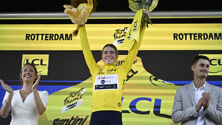 Vollering wins time trial to surge into women's Tour de France lead