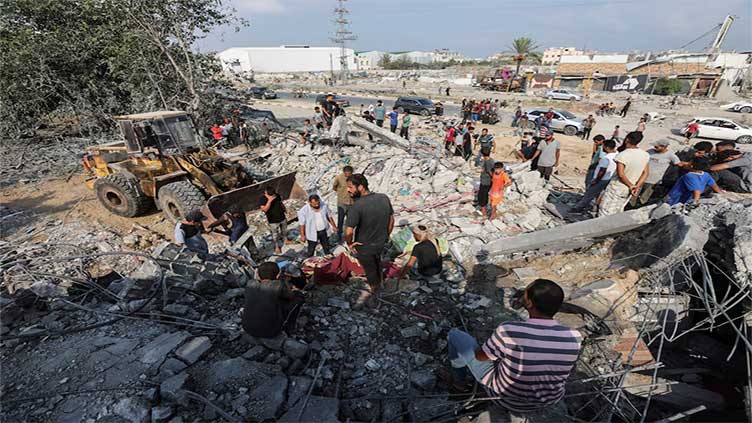 Israeli strike kills at least 17 Palestinians in central Gaza, health officials say