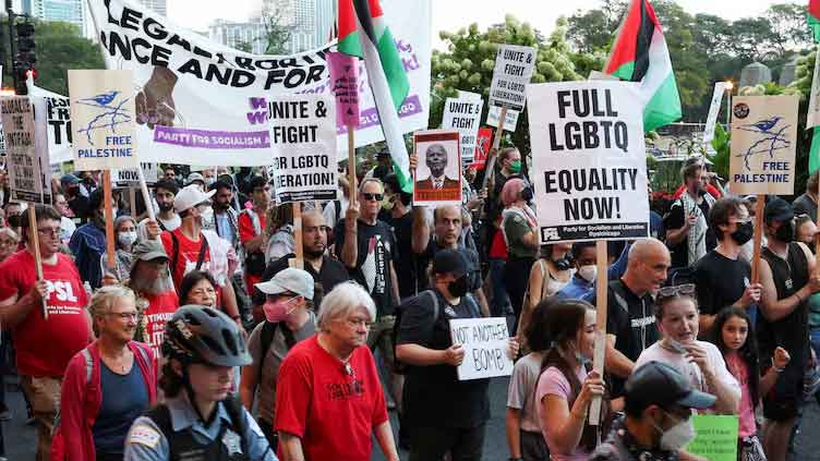 Democrats, protesters gather in Chicago to cheer, challenge Harris and Biden