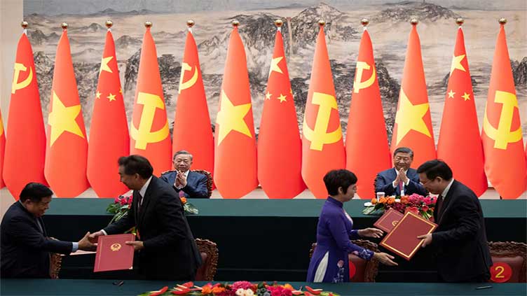 China and Vietnam sign 14 deals from rail to crocodiles after leaders meet