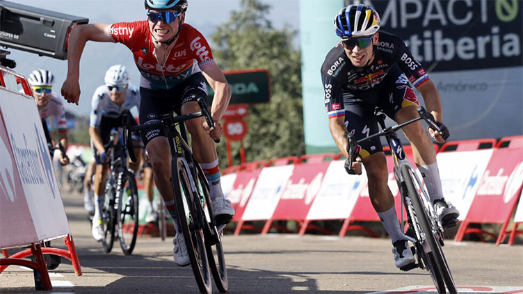 Roglic powers into Vuelta lead with stage four win