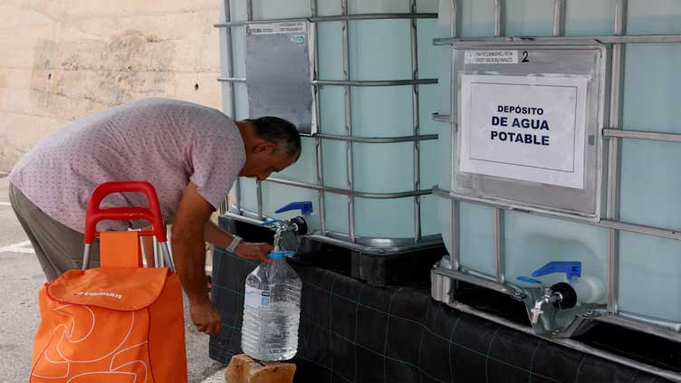 In Spain's drought-hit Costa Blanca, people queue for bottled water