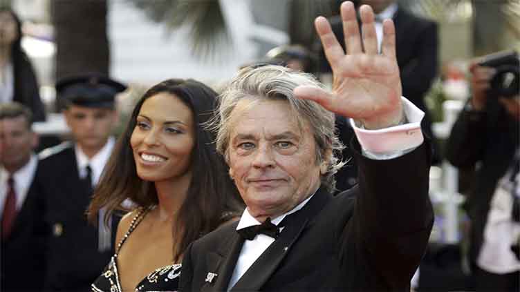 Late French film star Alain Delon wanted his dog buried with him