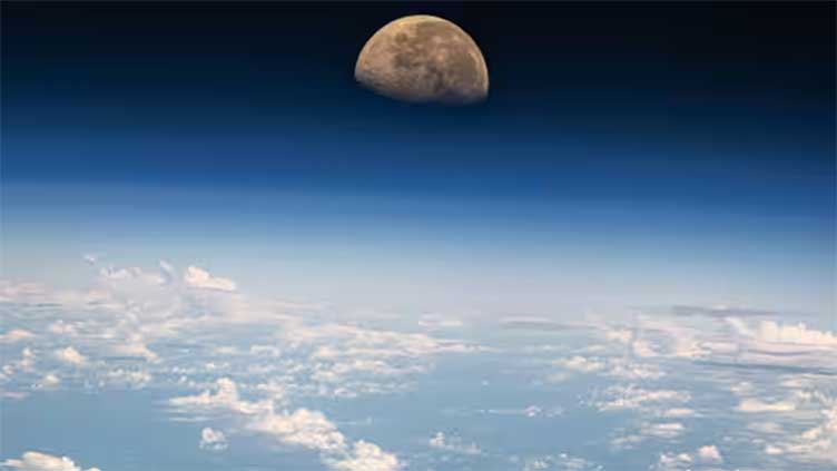 Nasa captures mesmerising scene of moon setting above the Pacific