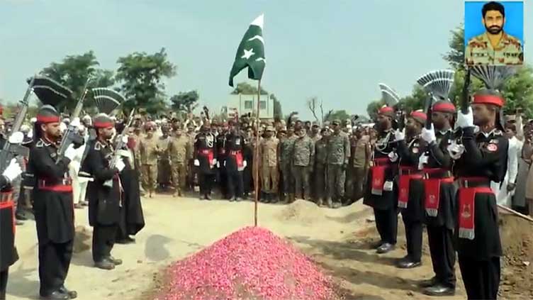 Martyred soldiers buried with military honours