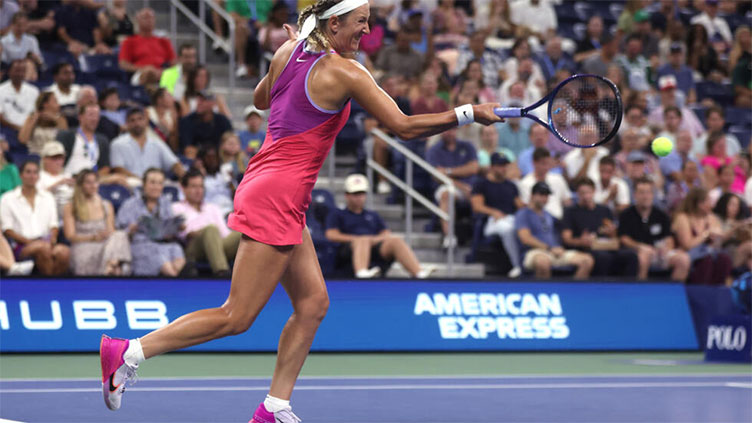 Tearful Azarenka dons sunglasses to ease US Open migraine