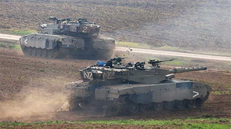 Israeli forces launch strikes across Gaza, push tanks into central Khan Younis