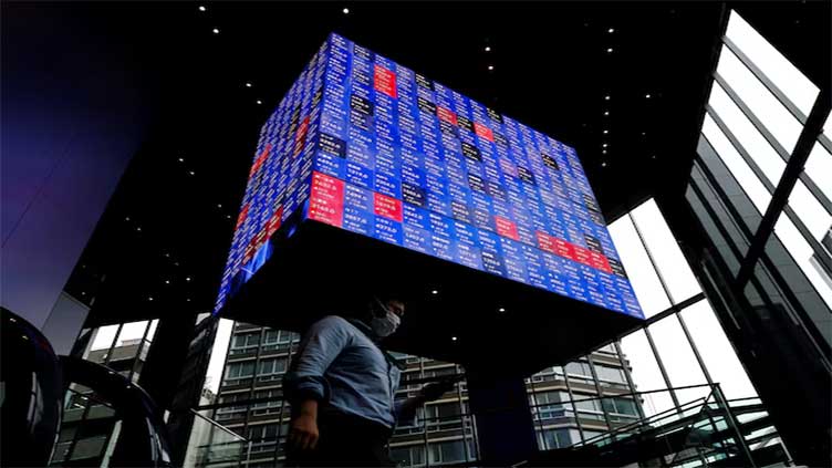 Asia shares set for solid monthly gain, dollar slumps