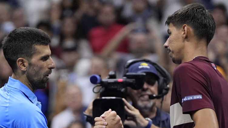 Defending champion Novak Djokovic is shocked at the US Open one night after Carlos Alcaraz's loss